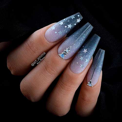 Cute gray ombre coffin shaped nails with glitter, stars and rhinestones!