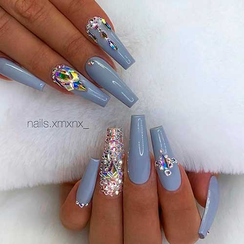 Cute light gray coffin nails with rhinestones!