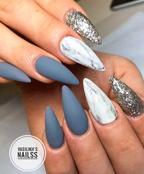 Cute matte gray almond nails with two accent marble and glitter nails design!