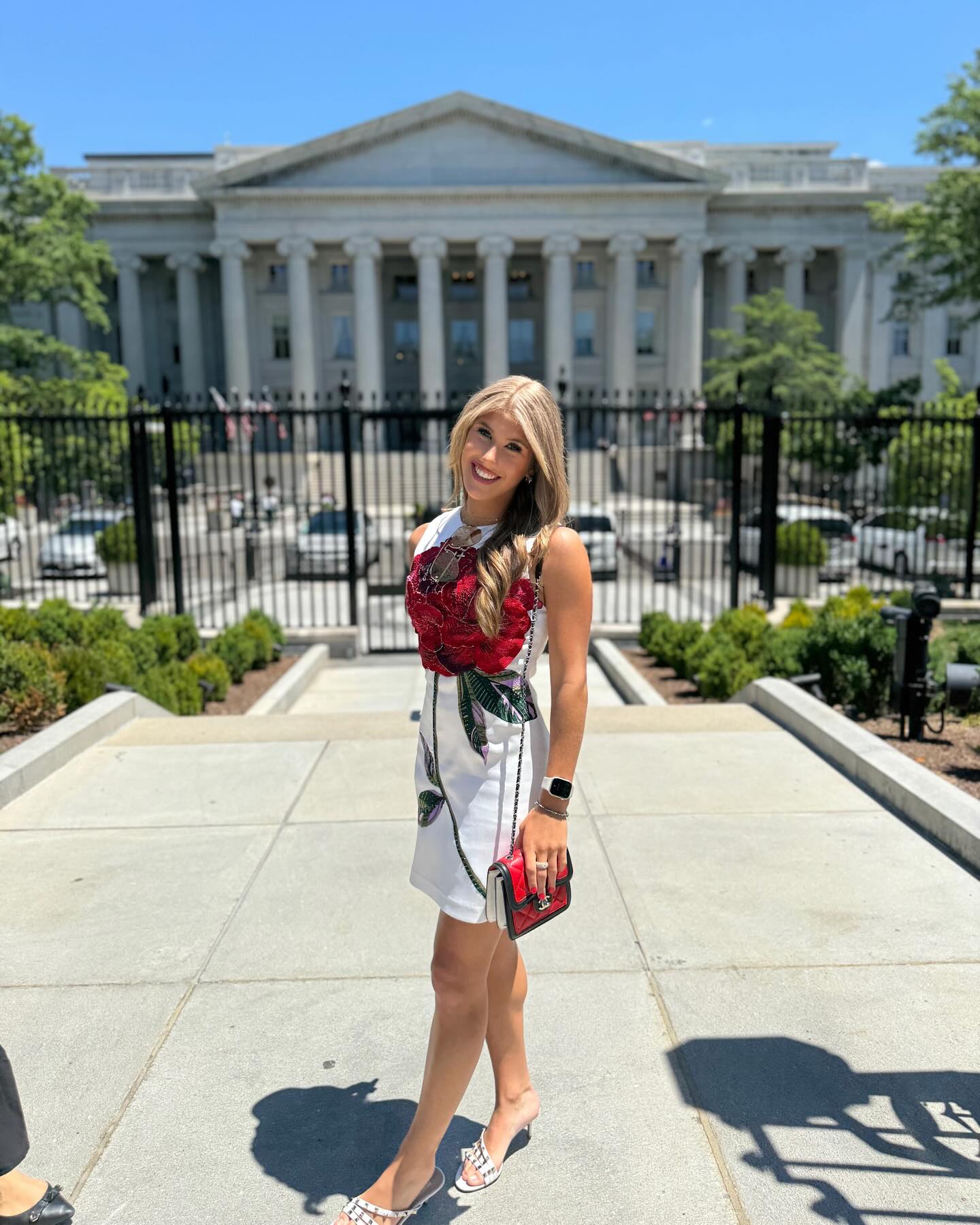 Ava Hunt posing in front of the White House